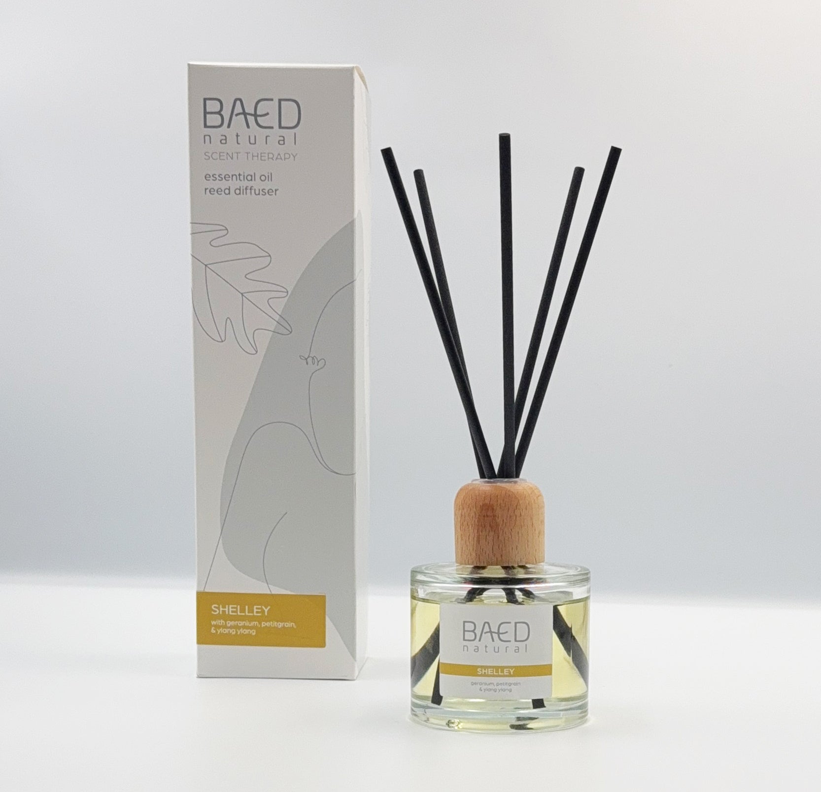 SHELLEY REED DIFFUSER WITH STICKS AND BOX. CLEAR GLASS JAR WITH LABEL